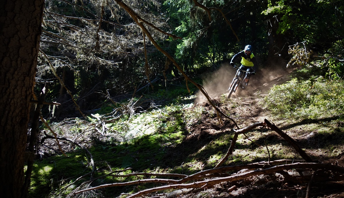 James railing (loam) ruts on the big bike on one of the many new Les Houches trails.