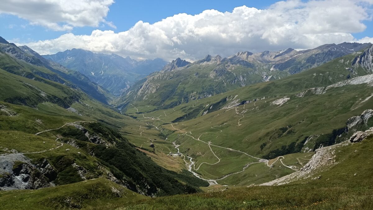 There's something quite cool about going for a long journey on your own and getting to really see distance for yourself. Next col, somewhere far away at the end of that valley. Only in this photo, I'm looking back where I'd been.