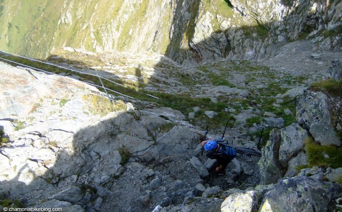 You know you're in Chamonix when you put your lid on to carry the bike uphill...